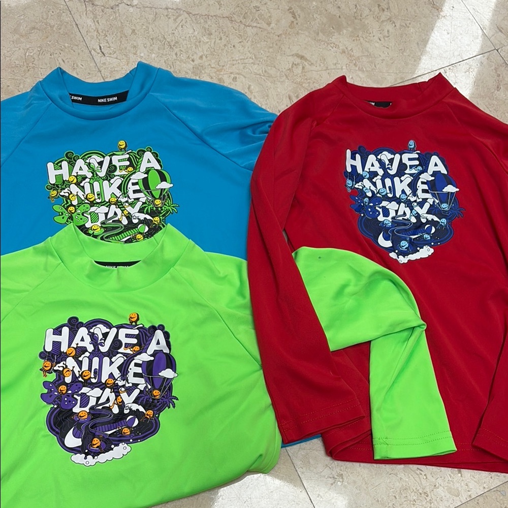 Bundle of Nike Swim Shirts 4-5 years